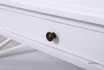 Zoomed-in view focusing on the coffee table's crisp white satin finish, exuding sophistication