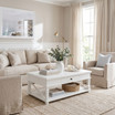 White Hampstead Coffee Table with Drawer featuring a spacious tabletop, concealed drawer and lower shelf with woven basket in a coastal-inspired living room.