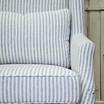 Close view of the Brereton Armchair’s comfortable seat cushion and Detailed image of the armrest
