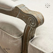 Detailed image highlighting the craftsmanship of the armrest of this French Provincial carving design
