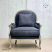 Front perspective of Montpellier Black Armchair with weathered oak frame.