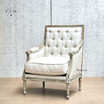 Diagonal perspective of the Hamptons style chair, focusing on the tufting and overall elegance