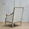 Rear angle highlighting the oak legs and back design of the Pembroke Armchair