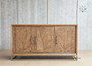 Full frontal view of the Darcy Oak Parquetry Buffet/Sideboard, showcasing its elegant design and gilded gold hardware.