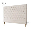 Angled view of the headboard, highlighting the depth of the tufting and the plush padding perfect for a hamptons bedroom
