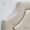 Zoomed-in view focusing on the embedded stud trim detail that adds sophistication to the headboard