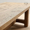 Detailed close-up highlighting the exquisite wood grain on the Trailbridge's oak tabletop