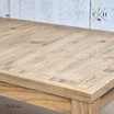 Focus on the Hartford table’s edge, revealing the fine finish and quality of the oak