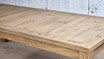 Close-up of the natural oak patterns at the table’s corner, showcasing organic beauty