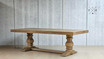 Full view of the Bedford Oak Dining Table, illustrating its design and stability
