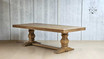 Angled view of the Bedford Oak Dining Table, highlighting the depth and craftsmanship of the design