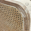 Close view of the weathered oak rattan back and frame details