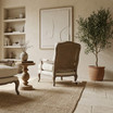 French Provincial inspired occasional armchair with weathered oak frame and handcrafted rattan detailing