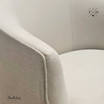 Detailed shot of the natural linen fabric, highlighting its texture and color