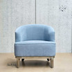 Front perspective of the Honor Tub Chair in blue chenille