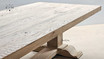The Charlested Oak Dining Table bathed in natural light, emphasizing its warm oak tones and unapologetic beauty