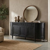 Angled view of the 200cm Louis Curved Sideboard in black in a modern dining setting