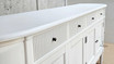Detailed image focusing on the finish of the Louis Curved 250cm Buffet, showing its quality and sheen
