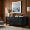 Angled view of the 250cm Louis curved buffet in black in a classic home with rich wall panelling