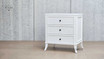 Side view of Piastri Bedside Table highlighting the classic design and hand-carved molding.