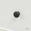 Close-up of the drawer handle detailing the elegant hardware.