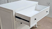 Angled top-down view of the Piastri Chest highlighting the top surface and drawer layout.