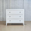 Front view of the Piastri 3 Drawer Chest showcasing its elegant white finish.