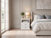 Wide interior shot of the Thomas and Hurley Fremont white nightstand in a sunlit room.