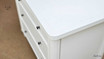 Top view of Brynmore 3 Drawer Nightstand featuring the white paint stroke patina.