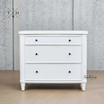 Front view of Brynmore 3 Drawer Bedside Table showing the elegant white finish and sleek lines.
