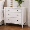 A white three drawer side table showcasing storage and clean simple design.