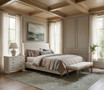 Angled perspective of the Thomas and Hurley Brynmore white bedside table in a sunlit bedroom.