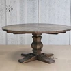 Full side view displaying the round shape and classic design of the Darcy Oak Parquetry Dining Table.