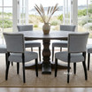 Darcy round oak parquetry table with Dalton upholstered dining chairs in a styled living room with natural light