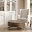 Warm natural oak round coffee table with parquetry detailing styled in an upscale Australian living space