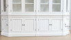 View of the cabinet's base, showcasing the solid construction and storage capacity with paneled doors.