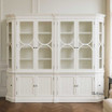 Zoomed in Front view of the Stonefield Double Display Cabinet Wall Unit with Angled Sides in situ in a living room