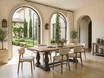 Framed by grand arched windows overlooking a landscaped courtyard, the Parkhouse Double Pedestal Dining Table becomes the focal point of this luxurious dining setting. Crafted for both style and everyday durability, it offers generous space for entertaining.