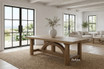 A Hamptons-style oak dining table styled in a Hamptons style luxury living room