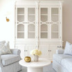 Front view of the Stonefield Double Display Wall Unit, in situ in a Modern Classic Living Room
