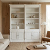 Hamptons style white bookcase cabinet in a styled living room