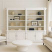 Front view of the Stonefield Double Bookcase Wall Unit with Angled Sides in situ in a living room setting