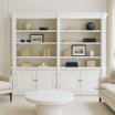 Zoomed in front view of the Stonefield Double Bookcase Wall Unit with Angled Sides in situ in a living room setting