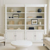 Zoomed in front view of the Stonefield Double Bookcase Wall Unit with Angled Sides in situ in a living room setting