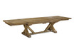 Hamilton luxury oak double extension dining table by Thomas & Hurley in its fully extended configuration, featuring twin end extensions and a sculptural cross-braced base.