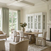 A styled living room and dining room view of the Sandringham Double Extension Dining Table with Carlyle Chairs by Thomas and Hurley, perfect for Hamptons inspired and contemporary dining spaces.