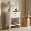 Close-up of the Lando 1 Drawer bedside table in white showcasing the spacious drawer, open shelf storage, bronze knob hardware and classic panel detailing.