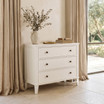 Close-up of the Lando 3 Drawer Chest in white highlighting the three spacious drawers, classic shaker-style panelling, bronze hardware and tapered legs.