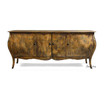 A front view of the Featherington Commode highlighting sculptural form and cabriole style legs.