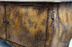 Door detail of the Featherington Commode showing understated hardware and a richly textured finish.